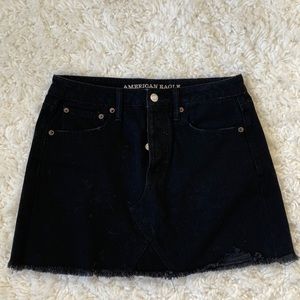 American Eagle black jean miniskirt with distressed edge